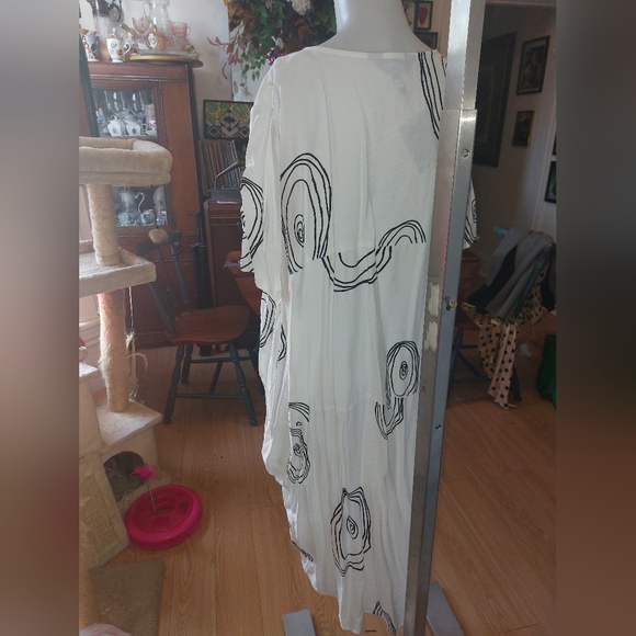 Amanda Collection, Flowy White Dress, with Black Swirl Designs. - Picture 2 of 5
